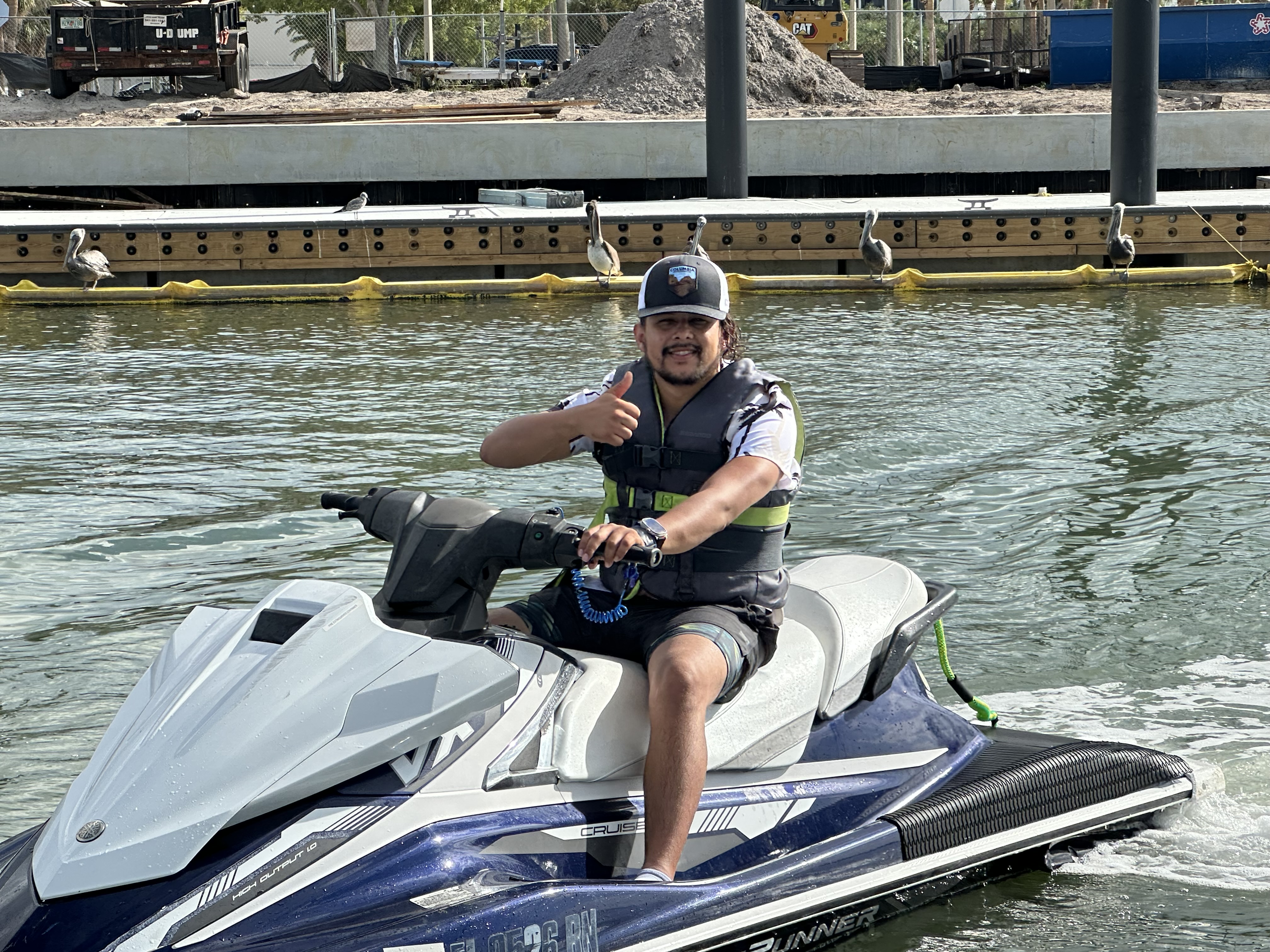 Man on jet ski giving thumbs up