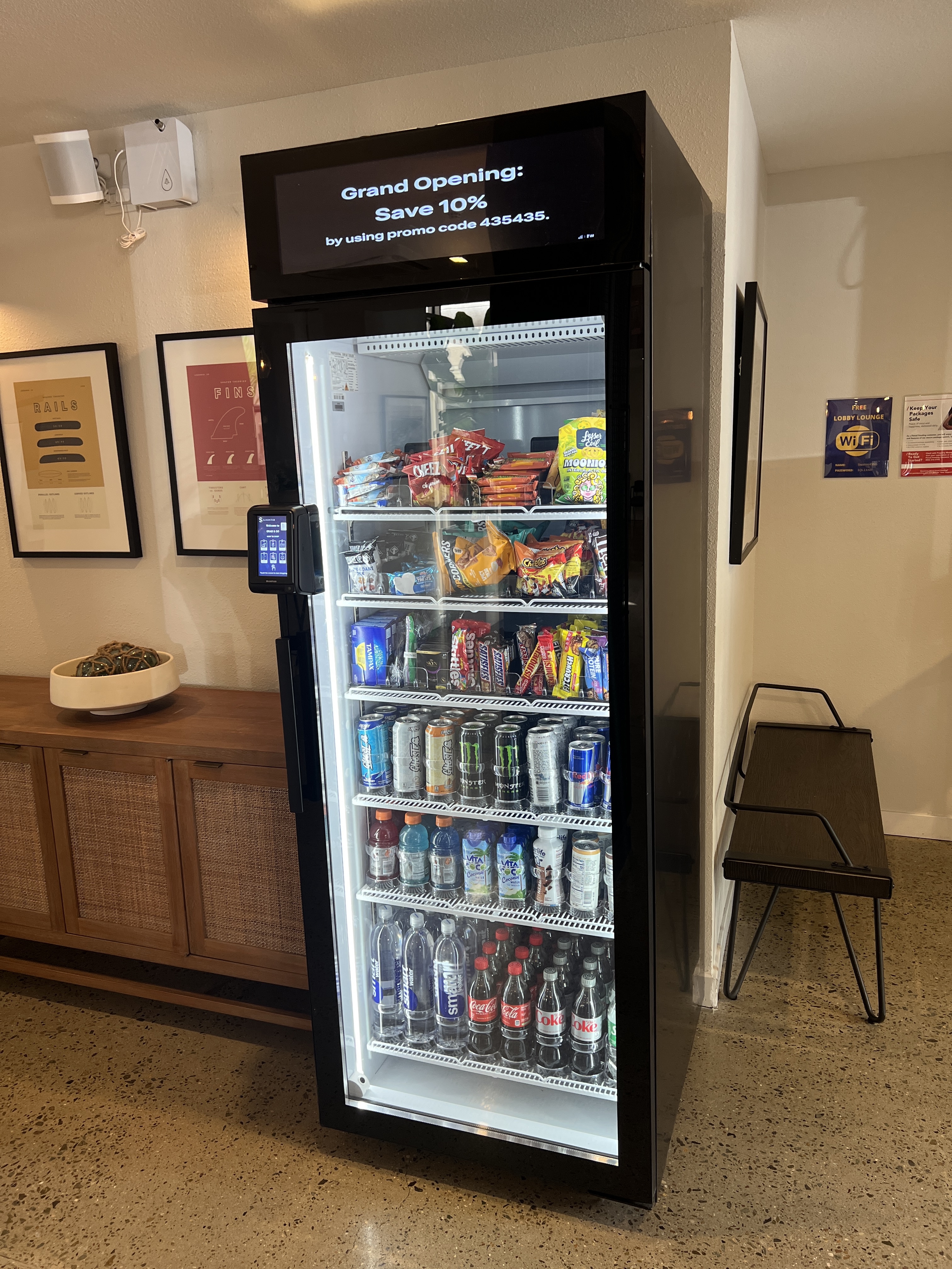 AI-powered smart cooler in office setting with digital display
