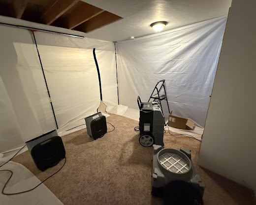 Water damage cleanup with industrial blowers and dehumidifiers